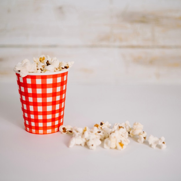 Plastic cup with popcorn