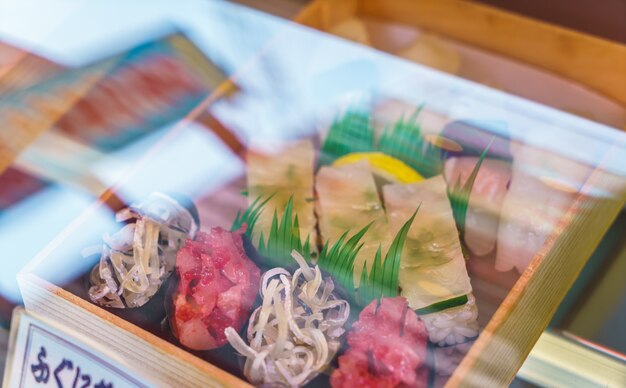 Plastic Sushi rolls in a display case