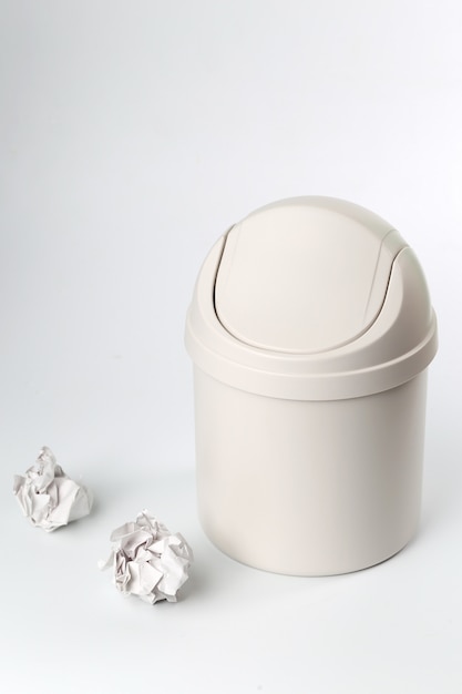 Free photo plastic trash can on white background