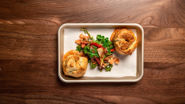 Plate of breads on wooden table