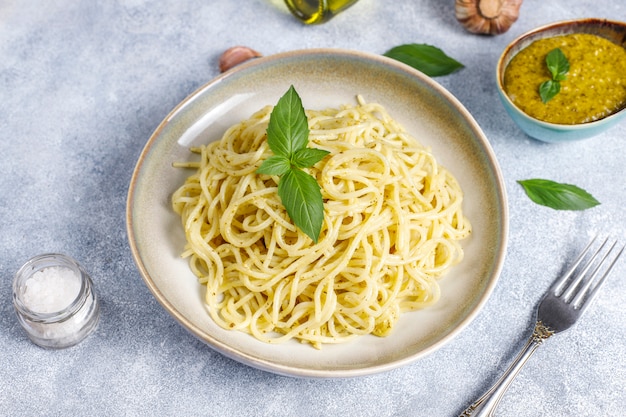 Free photo plate of pasta with homemade pesto sauce.