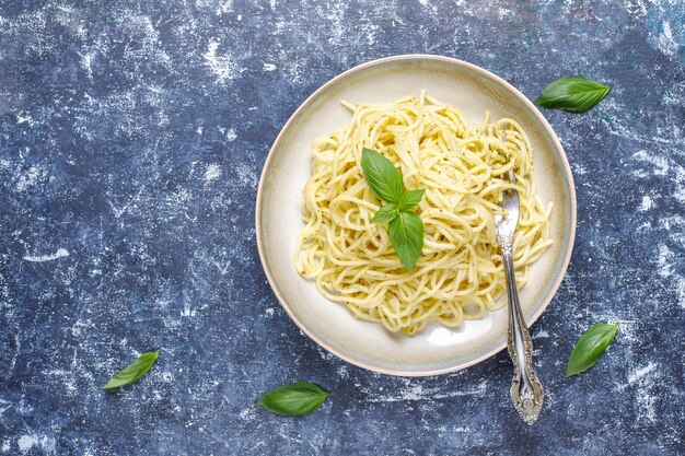 Plate of pasta with homemade pesto sauce.