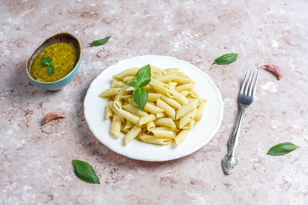 Plate of pasta with homemade pesto sauce.