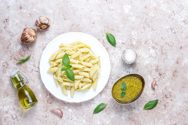 Plate of pasta with homemade pesto sauce.