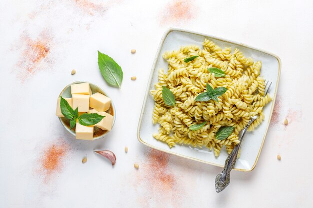 Plate of pasta with homemade pesto sauce.