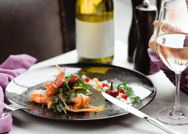 A plate with fish and herbs