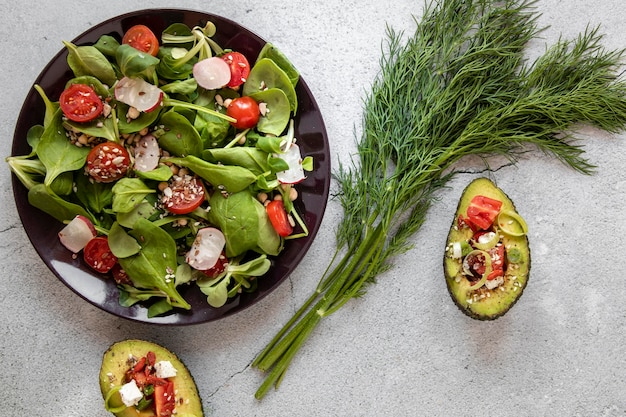 Plate with salad and avocado