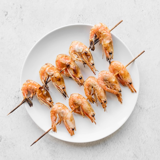 Free Photo plate with shrimp skewers