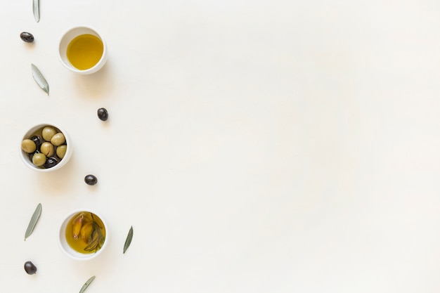 Plates with olives and oil 