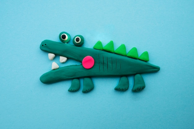 Free Photo play dough background with alligator