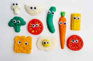 Free photo play dough background with vegetables