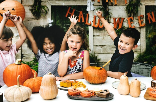 Playful kids enjoying the Halloween festival