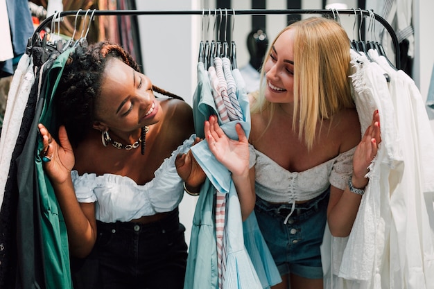 Playful women at shopping together