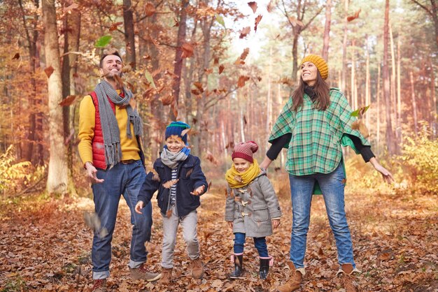 Playing with family in the forest