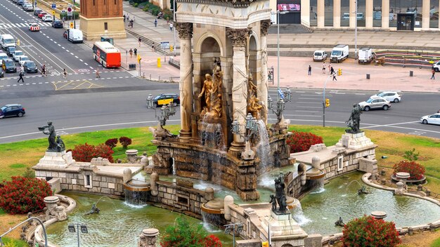 Plaza de Espana, the monument with fountain in Barcelona, Spain. Traffic