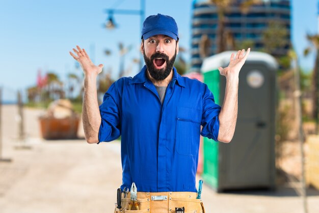 Plumber doing surprise gesture