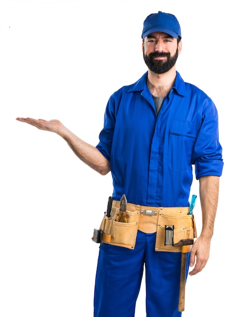 Plumber holding something