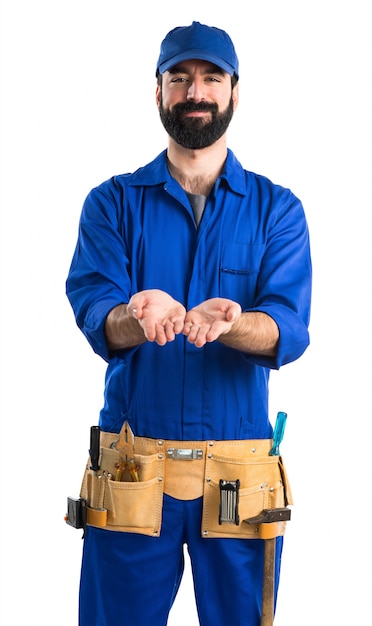 Plumber holding something