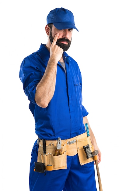 Free Photo plumber showing something