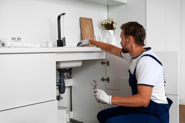 Plumbing professional doing his job