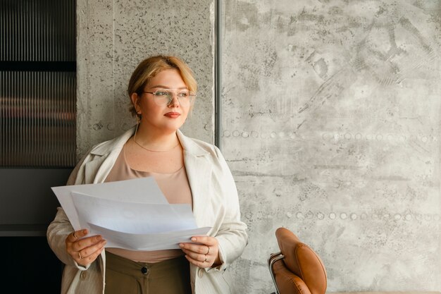 Plus-size business woman working in a professional office