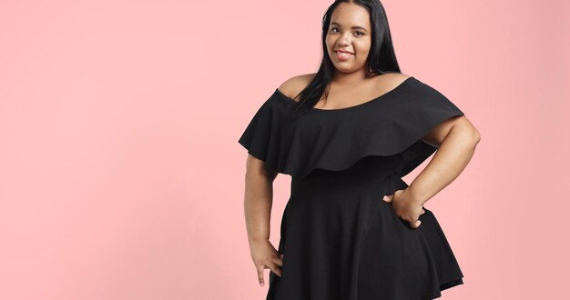 Plus size model in studio shoot happy smiling