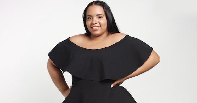 Free photo plus size model in studio shoot happy smiling