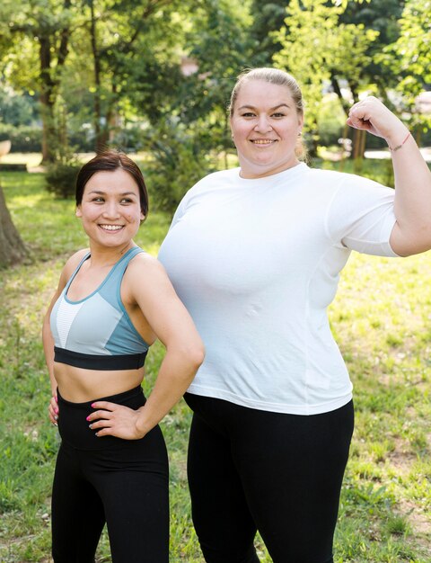 Plus size woman showing her muscles