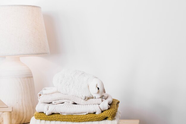 Plush sheep on blankets