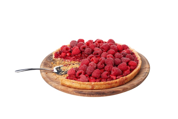 Free Photo png berry pie with raspberries on wooden plate isolated on white background