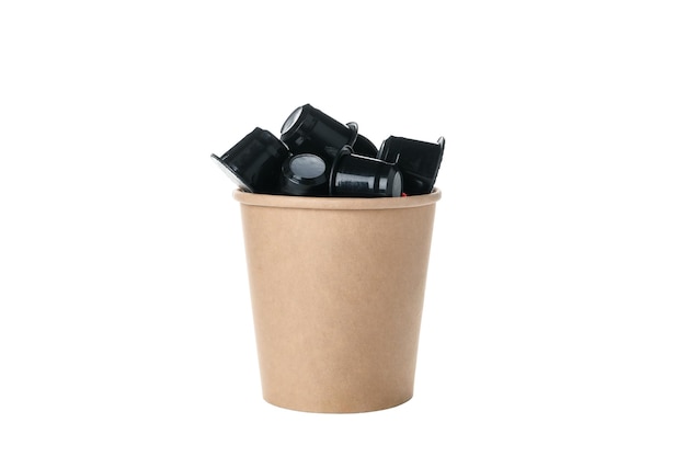 Free photo png black coffee capsules in paper cup isolated on white background