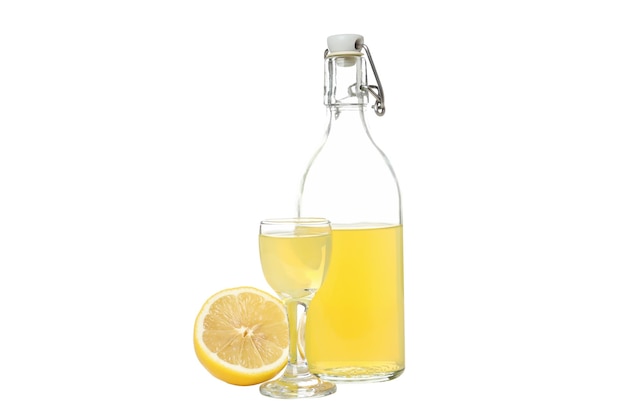 Free Photo png half of lemon bottle and glass with limoncello isolated on white background