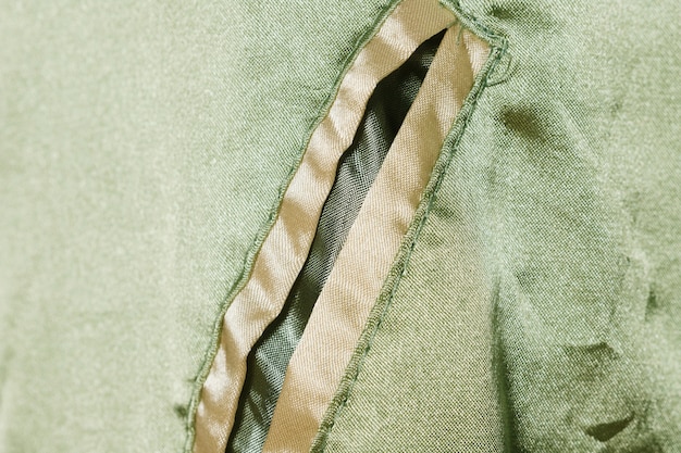 Free photo pocket of silk jacket close-up