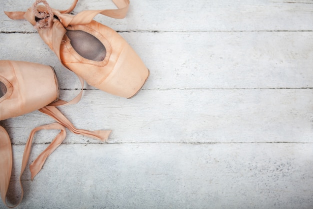 Pointe shoes on wooden