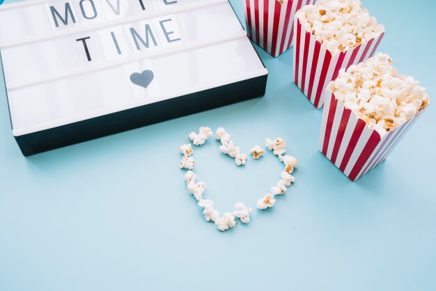 Popcorn box with a cinema sign