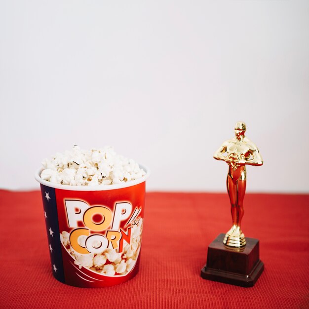 Popcorn bucket and shiny Oscar statuette