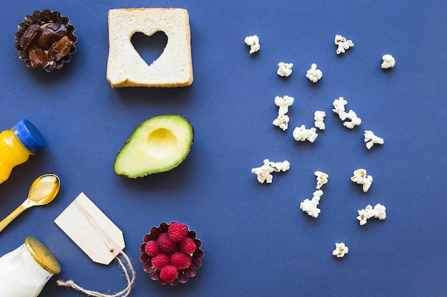 Free photo popcorn near healthy food