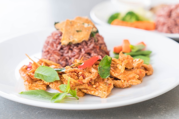 pork panning curry with berry rice and omelet