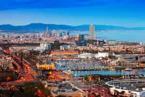 Free photo port vell during sunset from montjuic