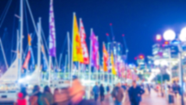 Free photo port with boats out of focus with flags