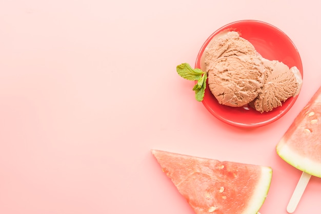 Portion of ice cream and watermelon popsicles