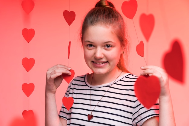 Free photo portrait of adorable young girl posing