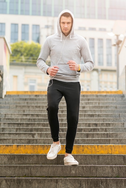 Free photo portrait of adult male exercising outdoors