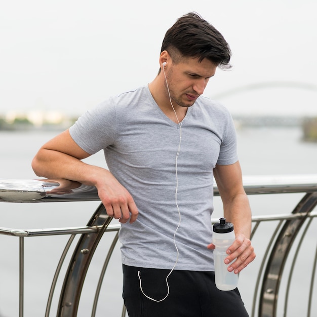 Portrait of adult male getting ready to exercise