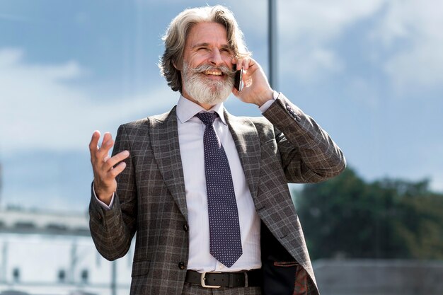 Portrait of adult male talking on the phone