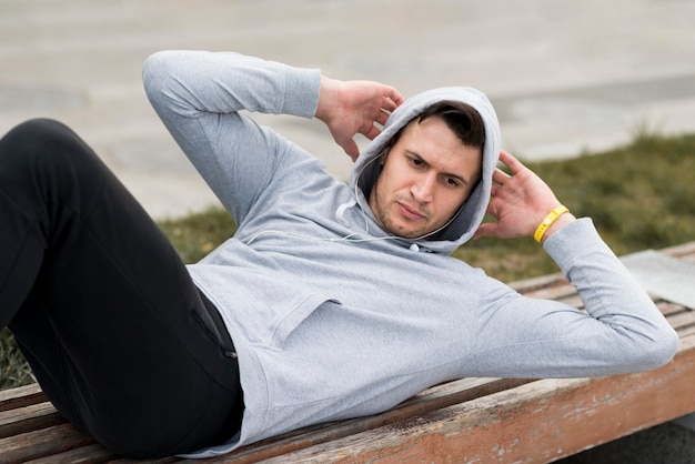 Free photo portrait of adult male training outdoors