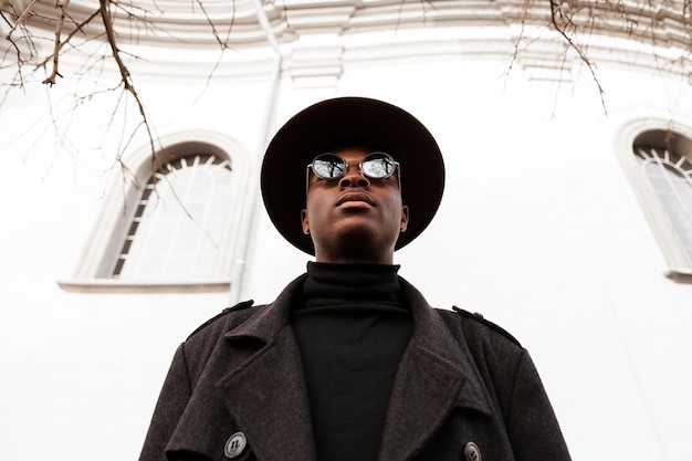 Portrait of adult male with sunglasses and hat