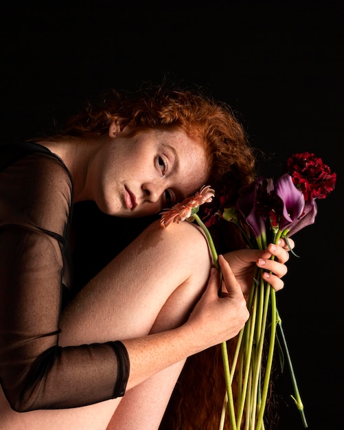 Portrait of adult woman with colorful flowers