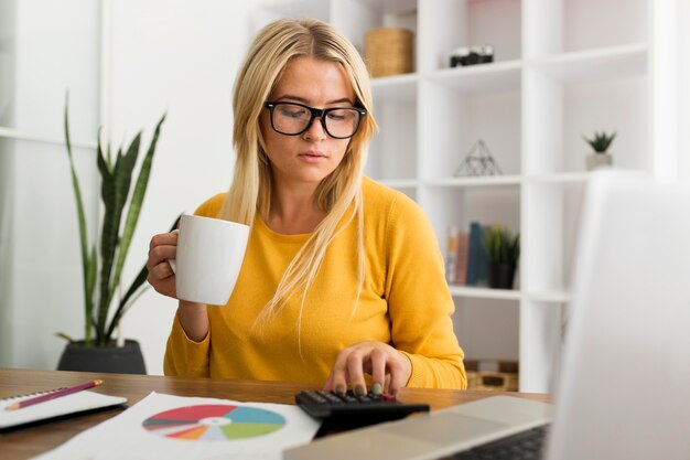 Portrait of adult woman working from home