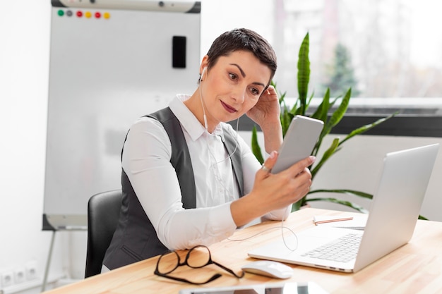 Portrait of adult woman working from the office